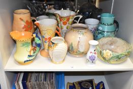 A Wade Heath ceramic pitcher of funnel form, decorated in the Art Deco style having twin handle