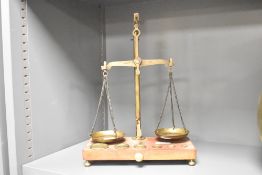 A early 20th century brass and wood weighing scale complete with weights, h35cm