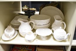 A late 20th century St Michael part tea / dinner service, having a textured foliage pattern on a