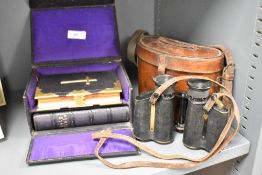 A cased set of the Holy Bible and book of Common Prayer, w18cm, sold together with a pair of early