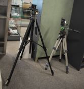 Two metal tripods, a Cullmann Mod. 2550 tripod built in Germany and a SLIK 88 made in Japan.