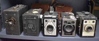 Five box cameras including a Butcher Midg No1 plate box camera, a Rex Coronet, a Kodak Six-20