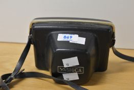 A Yashica Minster III camera, with Yashinon 45mm f2.8 lens.
