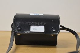 A pair of Yashica Aux. lenses. A telephoto and a Wide angle