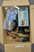 A selection of camera flashes, light meters, bellows etc