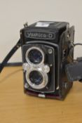 A Yashica-D twin lens reflex camera, with built in Yashinon 80mm f3.5 lens. The camera takes