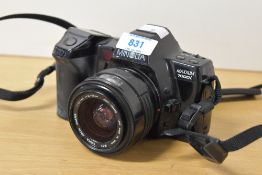 Two Minolta 35mm cameras, a Minolta SR-1s and a Minolta Maxxum 7000i with a Sigma 35-70mm f3.5-f4.