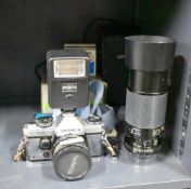 A Yashica FX-D Quartz camer with Instruction booklet, Yashica CS201 Flash having Yashica ML 1:2 50mm