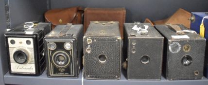 Nine box cameras, including a Coronet Ambassador, an Agfa Syncro, two Kodak Brownie No2, a Kodak