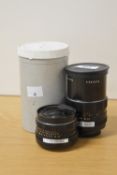 Two Pentacon M42 screw mount lenses, a Pentacon 29mm 2.8 lens and a Pentacon 135mm f2.8 lens.