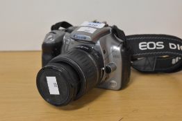 A Canon 300D digital camera with Canon EF-S 18-55mm f3.5 - f5.6 zoom lens. With Canon Battery
