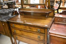 An early to mid 20th Century oak dressing table, width approx. 89cm