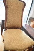 A Victorian nursing chair having later moquette upholstery
