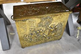 A late 19th Century coal box having embossed brasswork decoration , width approx. 66cm