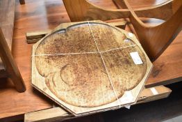 A folding occasional table having carved detail and scalloped tops