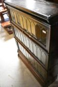 A Globe Wernicke oak three tier bookcase, width approx. 86cm