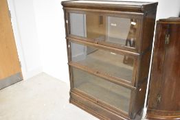 An early 20th Century oak three tier stacking bookcase. Labelled for Globe Wernicke Co Ltd, height