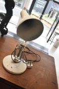 A vintage angle poise lamp, impressed mark for Anglepoise lighting company