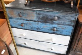 A painted chest of two over three drawers