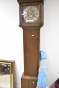An 18th Century oak long cased clock having eight day movement having square hood and column