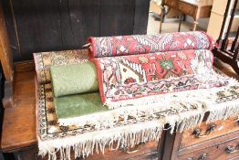 Three assorted rugs