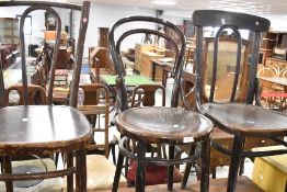 Three assorted bentwood chairs