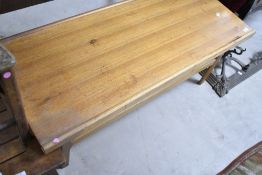 A vintage teak coffee table in the G plan style having slatted undertier, approx. 111 x 46cm