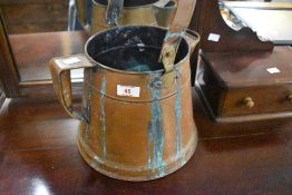 A vintage copper waterjug