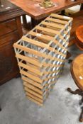 A pine and galvanised metal 48 bottle wine rack