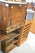 A late 19th or early 20th Century oak slim line bureau desk in the Arts & Crafts style, dimensions