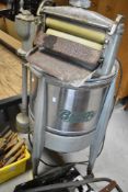 A vintage Beatty Bros top loading washing machine (sold as decorative)