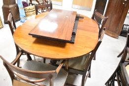 A nice quality Regency style mahogany extending dining table and set of eleven (ten plus one)