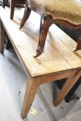 A rustic pine farmhouse style kitchen table, approx. 137 x 64cm