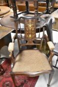 An Edwardian mahogany carver chair having detailed multi wood inlay to back, and line inlay to