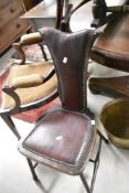 A Victorian stained frame occasional chair having studded leather seat and Y back, with turned H