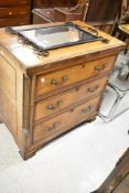 A 19th Century oak chest of nice proportions having mahogany cross banding, corinthian column