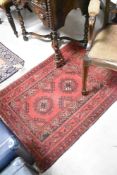 A vintage Afghan or Turkmen style rug, approx 107 x 75cm