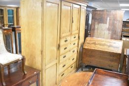 A Victorian ash wardrobe/linen press in the Aesthetic style , dimensions approx. W230 D59 H217cm
