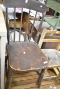 A 19th Century stained frame spindle back kitchen chair and a vintage childs chair