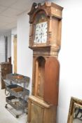 A 19th Century mahogany cased long case clock having 8 day movement and painted dial named for