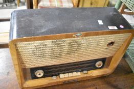 A vintage HMV radio, width 50cm and a woven sewing box (not Lloyd Loom)