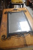 A modern metalwork wall mirror, approx. 70 x 45cm