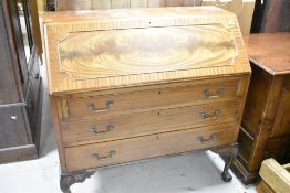 An early 20th Century bureau, on ball and claw feet, width approx. 107cm