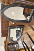 A set of three vintage Gothic style wall mirrors having candle holder attachments, labelled on