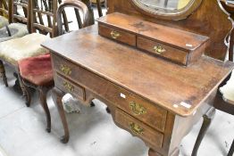 A nice quality reproduction oak Georgian style dressing table on Queen Anne style legs, width