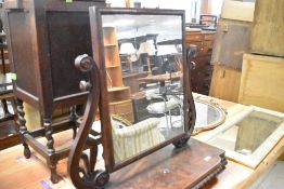 A 19th Century flame mahogany toilet mirror, width approx. 73cm