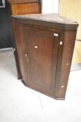 A 19th Century oak corner cupboard, height approx. 98cm