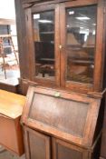 A late 19th or early 20th Century oak bureau bookcase