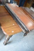A Victorian mahogany extending dining table (no winder)
