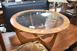 A vintage teak 'Astro' coffee table having glass top, diameter approx. 84cm